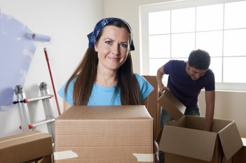 Packed office boxes and labeled equipment for Millhill relocation
