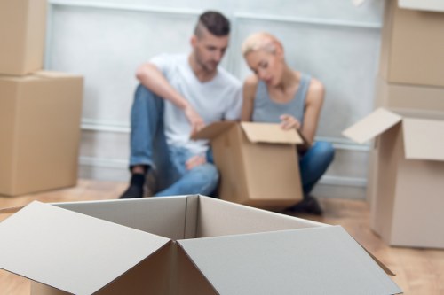 Packed boxes and furniture ready for apartment removals