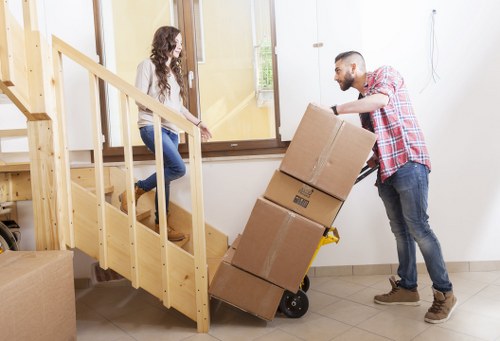 House movers in Millhill loading furniture safely into a moving truck