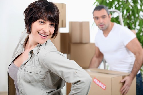 Packing and loading household items for a local Mill Hill relocation