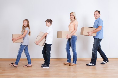 Professional office removal team handling IT and furniture