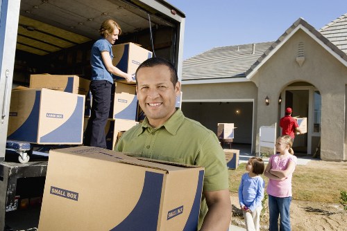 Local packing team organising boxes during a move in Mill Hill